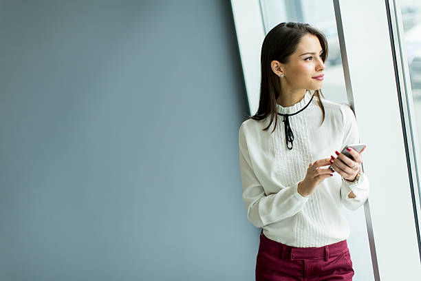 istock Woman with a phone 525484030