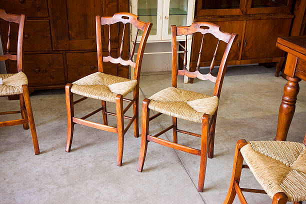 istock Typical italian wooden straw chairs with turned parts 525487550