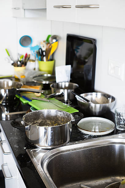 istock Mess in a domestic kitchen after cooking. Selective focus. 525490550