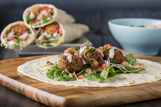 istock Vegan Falafel Wrap With Salsa 525490656