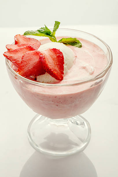 istock Strawberry ice cream white background 525492858