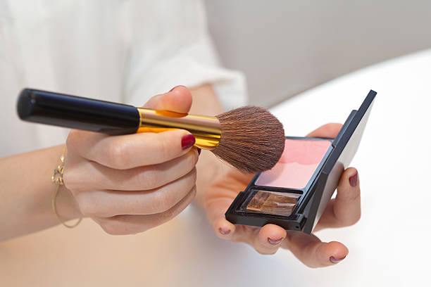 istock Professional make up brush on pink blush 525494976