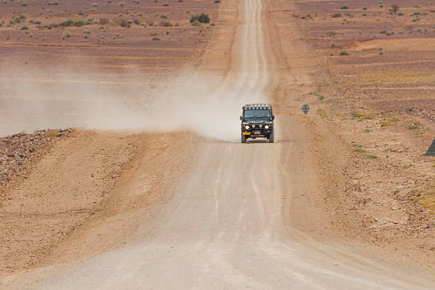 istock SUV in the scenic road to Fish River Canyon, Namibia 525495898