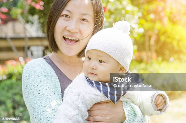 Young Mom And Her Cute Baby Stock Photo - Download Image Now - Adult, Asian and Indian Ethnicities, Baby - Human Age