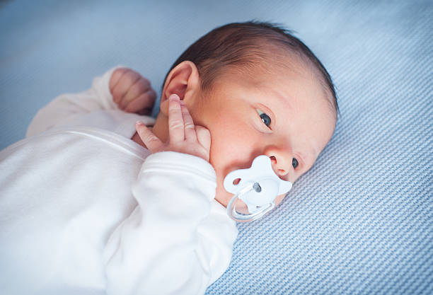 istock Little newborn baby 525498776