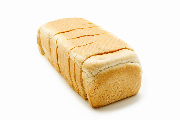 istock Sliced whole bread isolated on white background 525499944