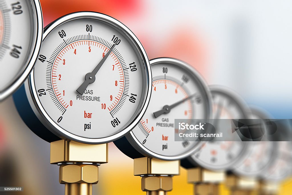 Row of industrial high pressure gas gauge meters See also: Natural Gas Stock Photo