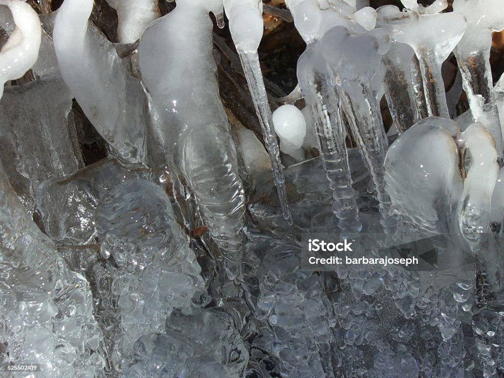 Ice Delight Abstract shapes and texture of nature's best - water frozen into sculptures of ice and icicles. Abstract Stock Photo