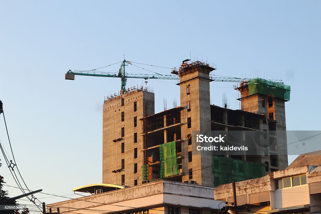 under construction building under construction building with clearly blue sky in the evening. Architecture Stock Photo