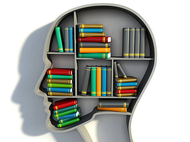 istock book shelf in form of head on white backgrounds 525513043