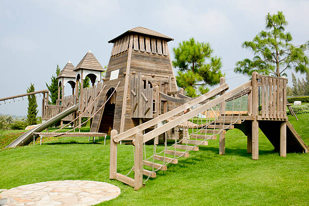 istock Children's Playground made from wood in park 525514369