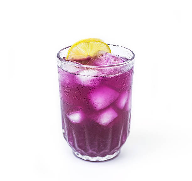 istock Butterfly pea juice with lemon in cold glass, 525524443