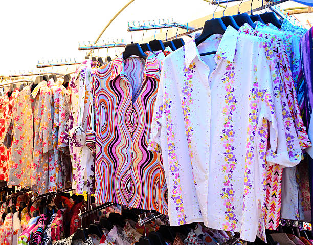 istock Women shirts on display in the market 525524657
