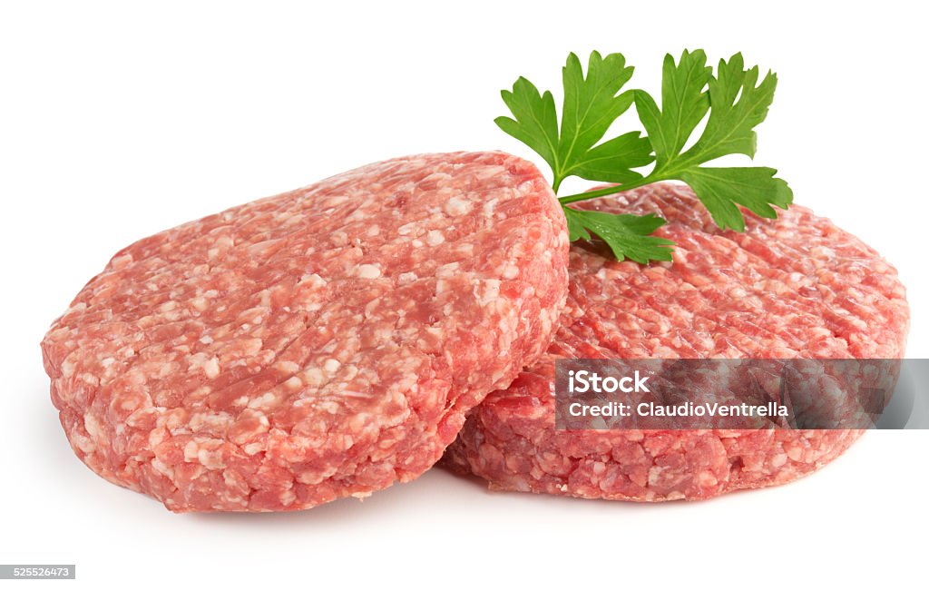 hamburger patties hamburger patties and parsley isolated on white background Hamburger Stock Photo