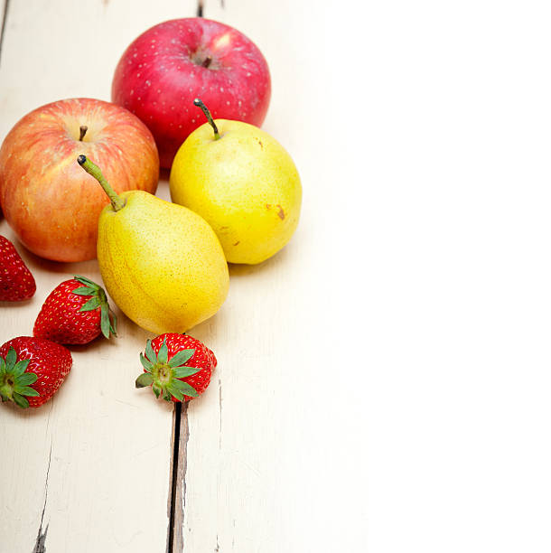 istock fresh fruits apples pears and strawberrys 525528309