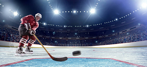 ice hockey player-punkten der baner-ready - ice hockey hockey puck playing shooting at goal stock-fotos und bilder