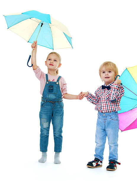 istock boy with a girl standing 525530079
