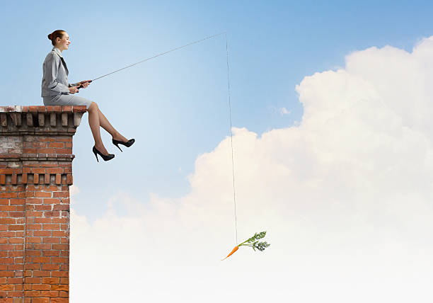 istock Businesswoman with rod 525530557