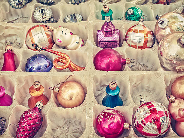 Retro styled image of old Christmas balls Retro styled image of old Christmas balls in a box christmas decoration storage stock pictures, royalty-free photos & images