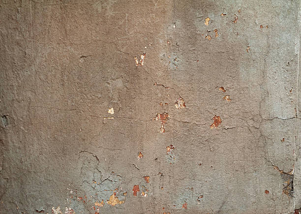 istock Texture of old wall covered with gray stucco 525542009