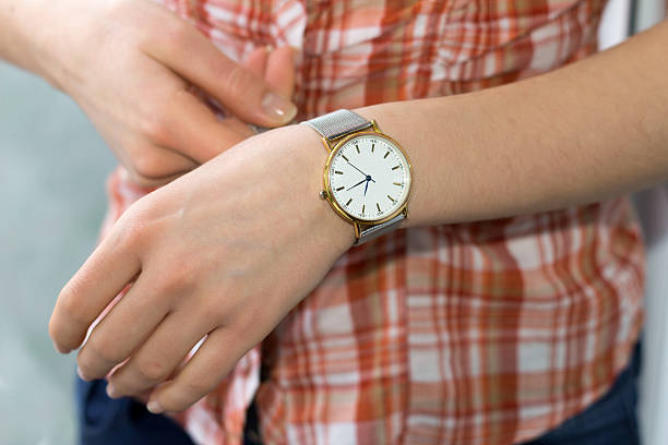 istock Woman hand with a watch 525543865