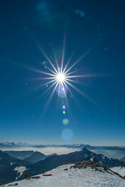 High mountain landscape with sun in the French Alps 