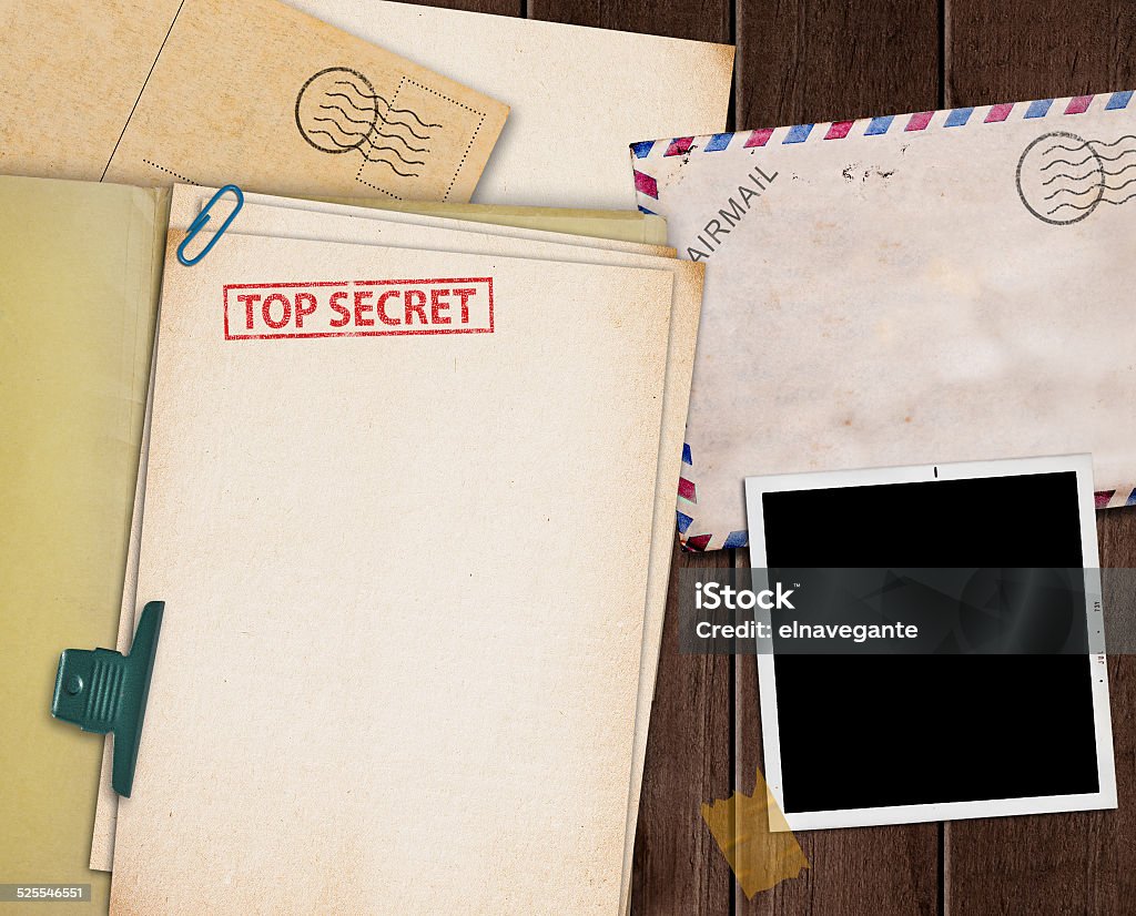 Top secret folder. folder with TOP SECRET stamped across the front page and a blank photograph Top Secret Stock Photo
