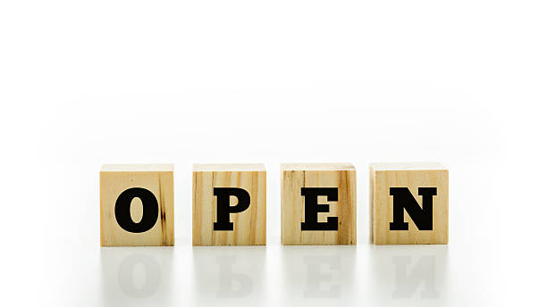istock The word Open on four natural wooden cubes 525547283