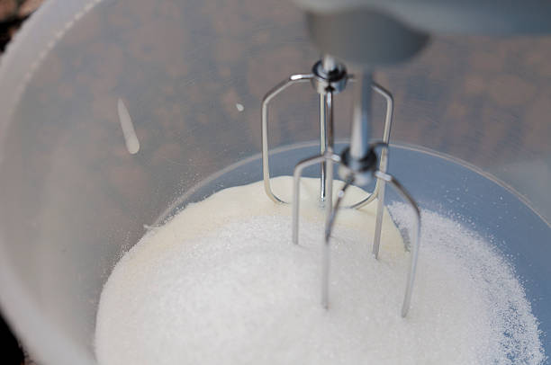 istock Mixing ingredients in bowl with motor mixer, baking a cake 525547749