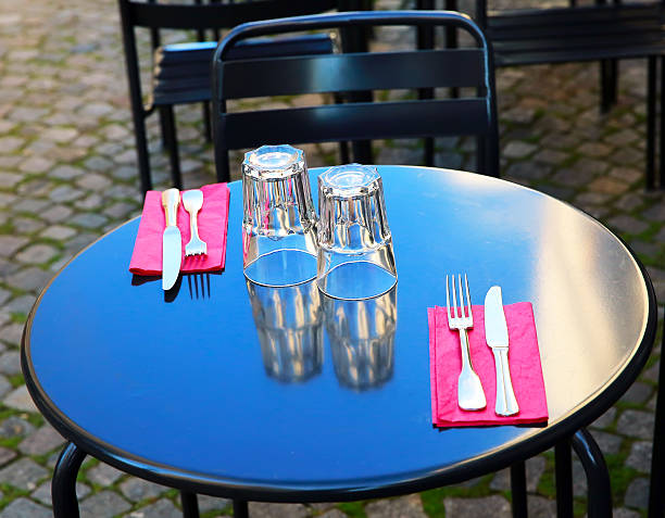 istock Street view of a glasses on a table 525555815