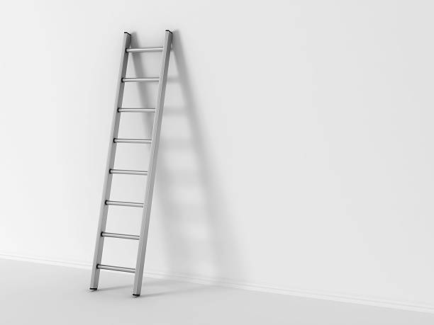 istock 3d illustration of ladder in square hole over white background 525557217