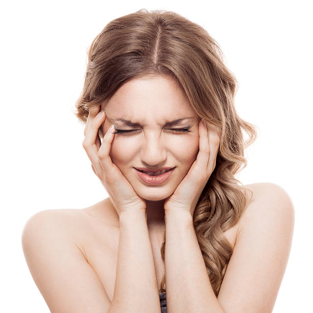 istock Lovely confused woman against white background 525558497