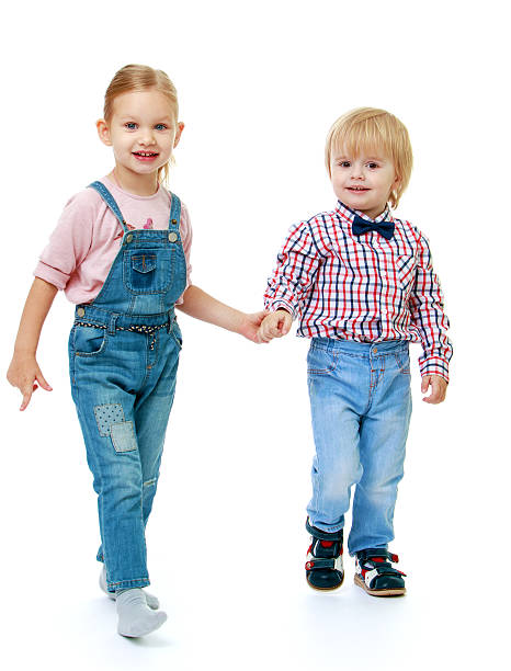 istock boy with a girl standing 525558581