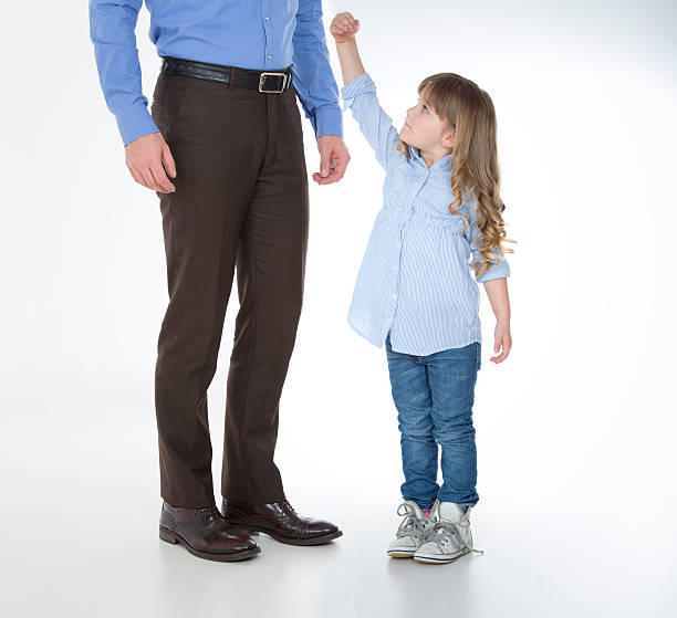 istock portrait of man and daughter 525558875