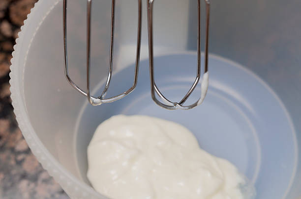 istock Mixing ingredients in bowl with motor mixer, baking a cake 525560617