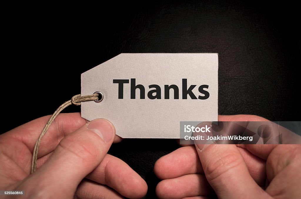 Tag - Thanks Tag with the word "Thanks" written on it. Black Color Stock Photo