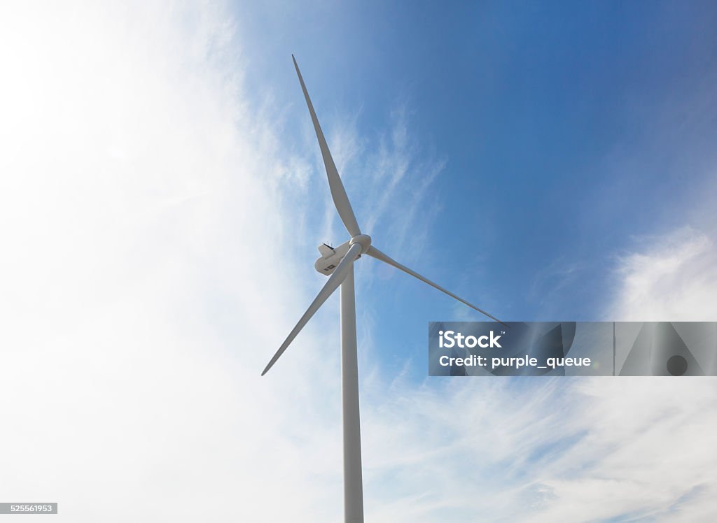 wind turbine power generation a large wind turbine for power generation in front of blue sky Blue Stock Photo
