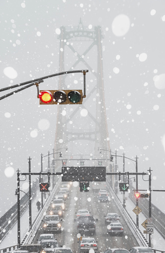 Rush hour traffic during a heavy snowfall on the Angus L. MacDonald Bridge.