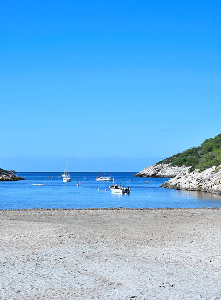 istock empty beach with fisher boats 525570841