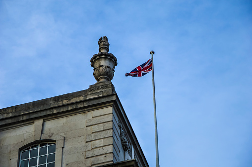 UK flag in London street on a building