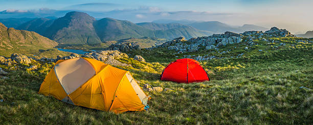 istock Wild camping in idyllic mountain landscape panorama Lake District Cumbria 525586923