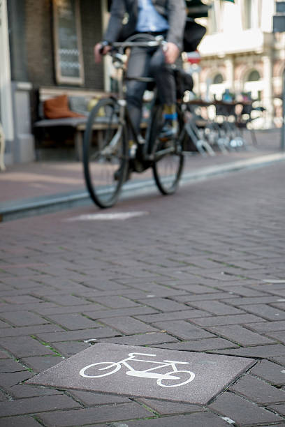 Businessman with a bicycle stock photo