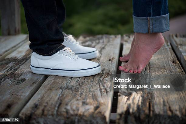 Young Lovers At Beach On Pier Stock Photo - Download Image Now - Kissing, 2014, Adult