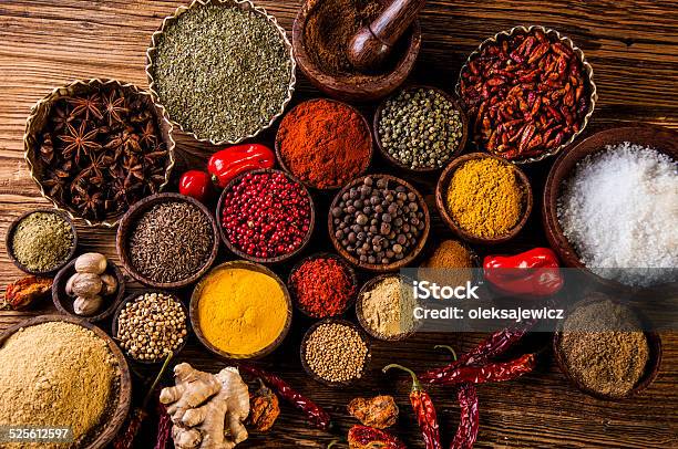 Oriental Hot Spices On Wooden Table Stock Photo - Download Image Now - Spice, Seasoning, Food