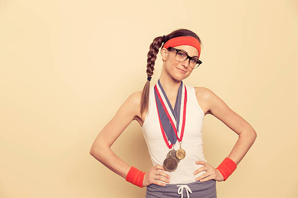 istock Young Woman Retro Nerd With Gold Medal 525614035
