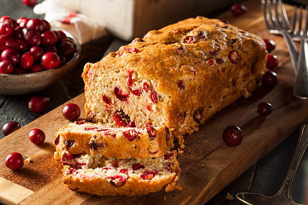 Homemade Festive Cranberry Bread Homemade Festive Cranberry Bread with Fresh Berries cranberry stock pictures, royalty-free photos & images