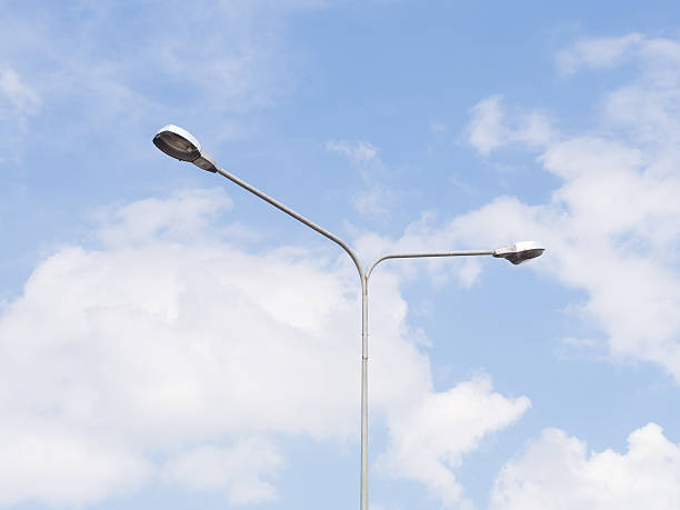 istock Street light over blue sky 525623753