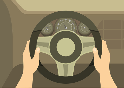 human hands drive a car behind the wheel kept visible dashboard panel
