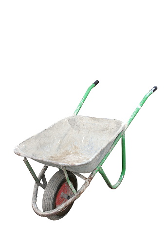 old dirty metallic wheelbarrow isolated over white background