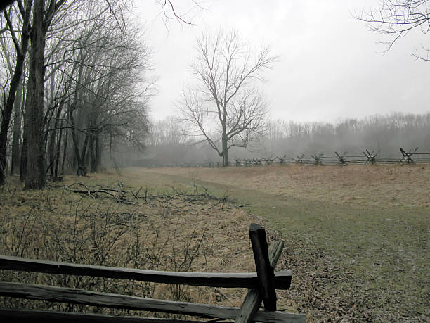 istock Sunken Road with Fog and Fence 525628497